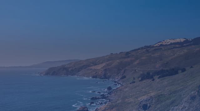 A Southern California coastline of bluffs, beach, and the Pacific, like the Oceanside area near MCB Camp Pendleton.