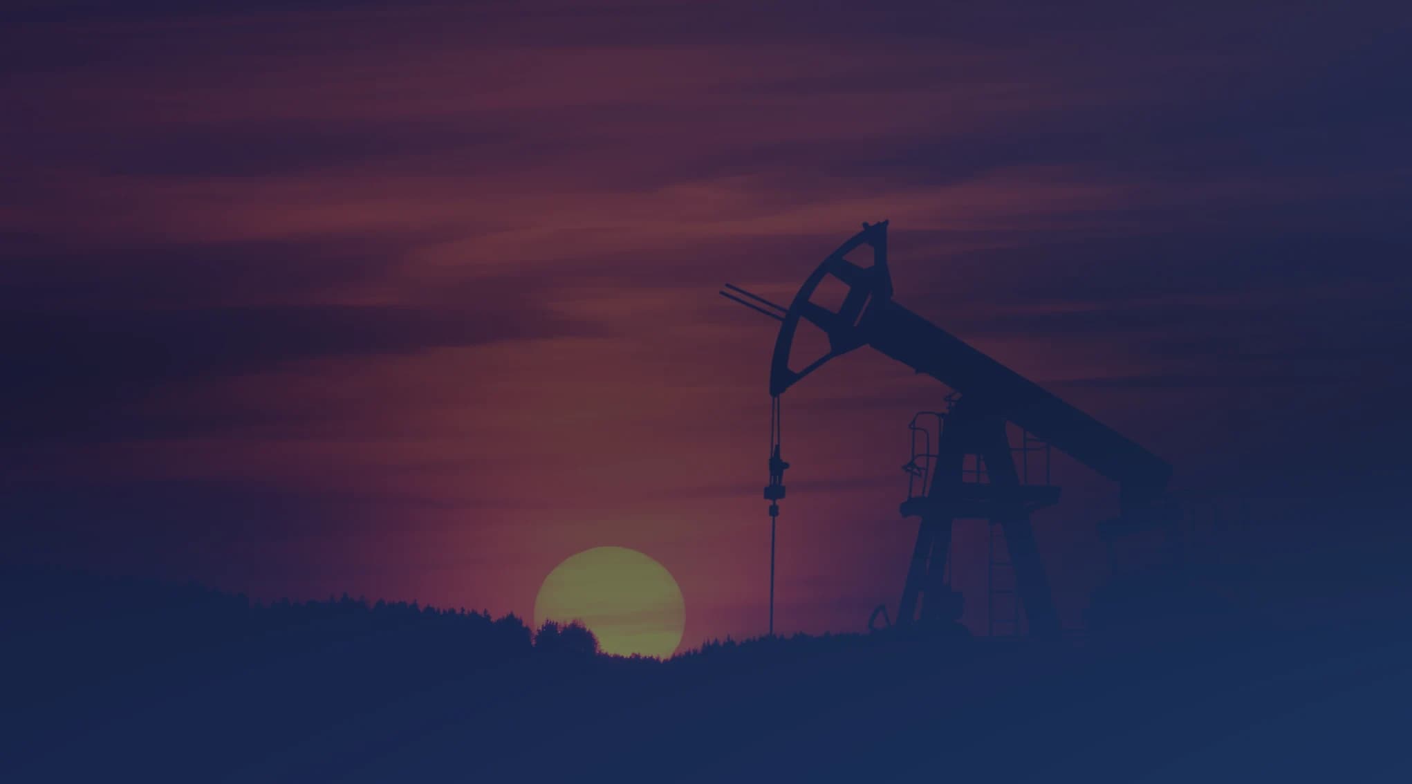 An oil pump jack silhouetted against an evening sky, a reminder of the oil and gas industry that shapes life in the Permian Basin around Midland and Odessa.