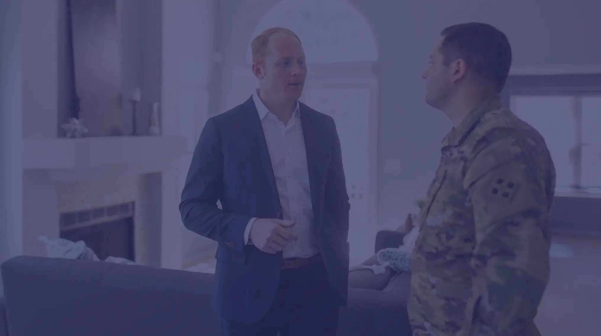 Jason Anderson, Founder & CEO of VeteranPCS, helps an active duty solider close on a home.