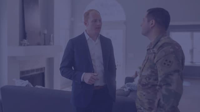 Jason Anderson, Founder & CEO of VeteranPCS, helps an active duty solider close on a home.