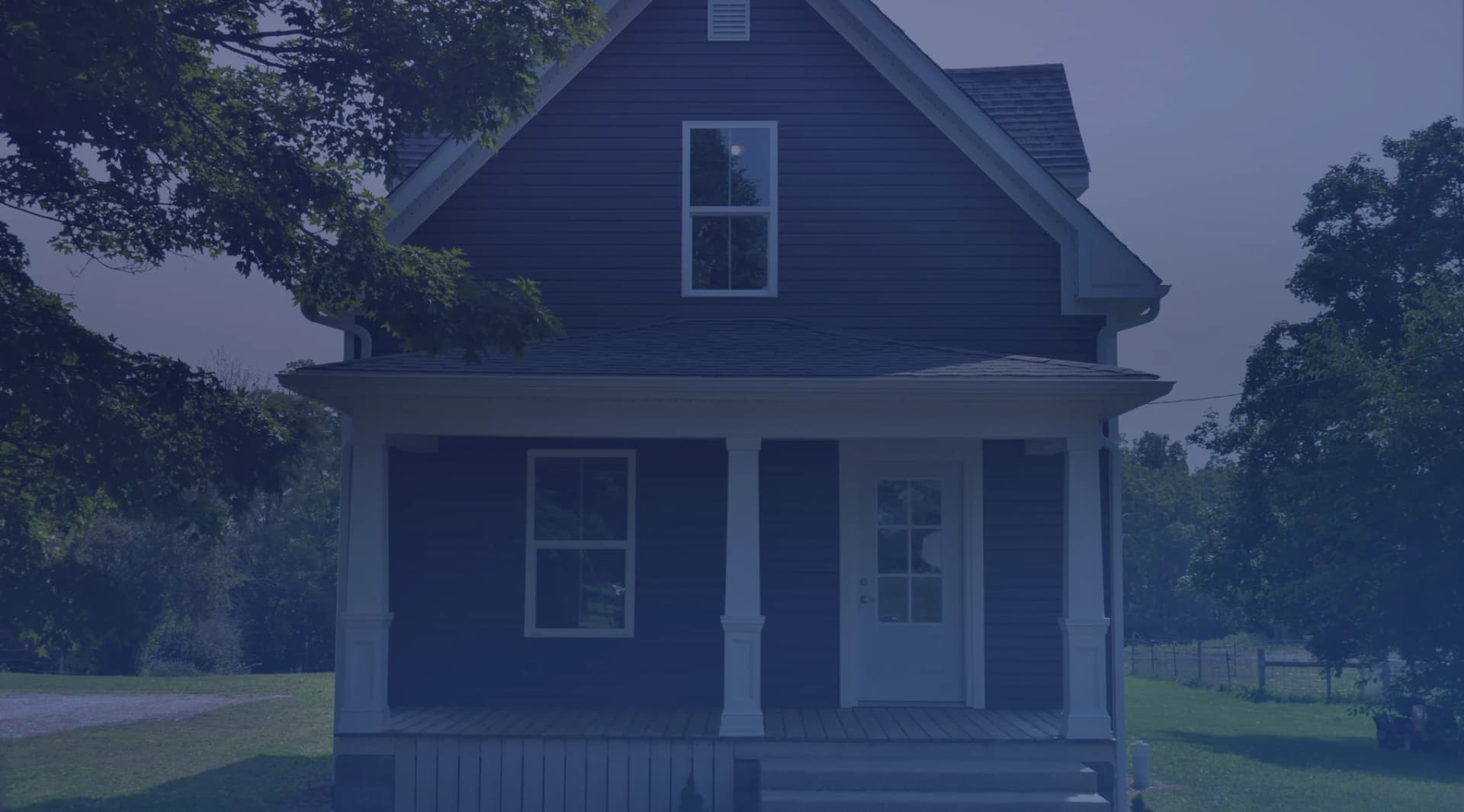 Real estate agent reviewing a home contract with military clients