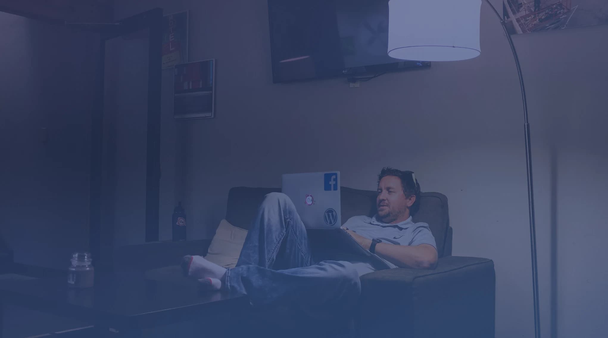 Service member taking a live video home tour on a laptop during a PCS move