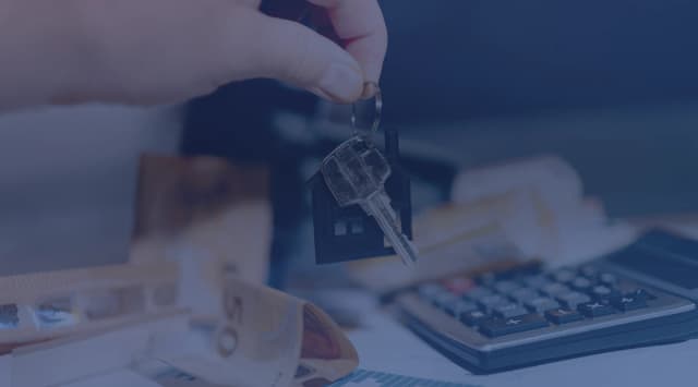 Calculator and home keys representing BAH buy versus rent in Huntsville