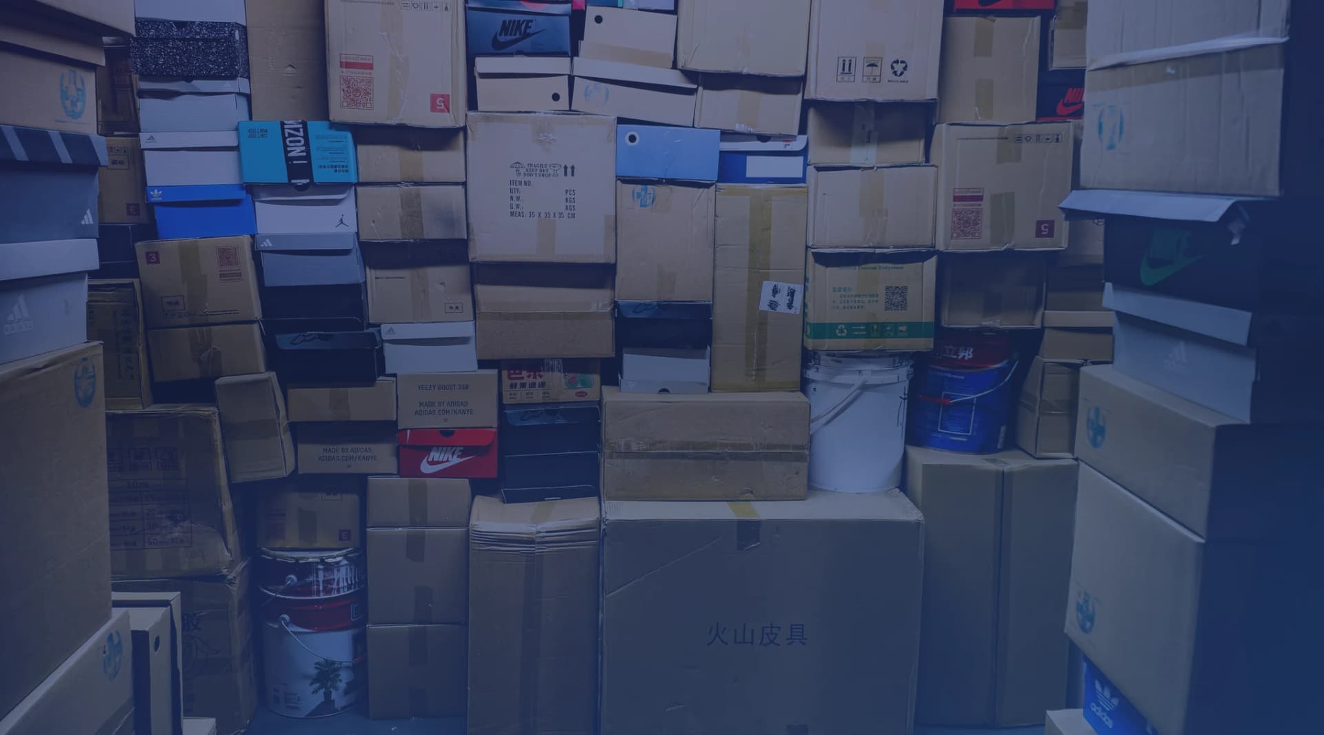 Household goods boxes stacked and ready for a military PCS move