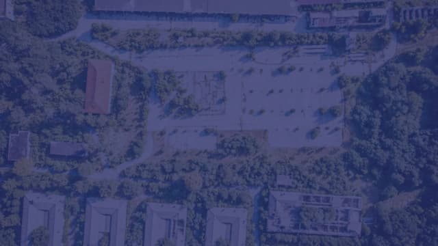 Aerial view of a Florida military installation surrounded by pine forest and base housing.