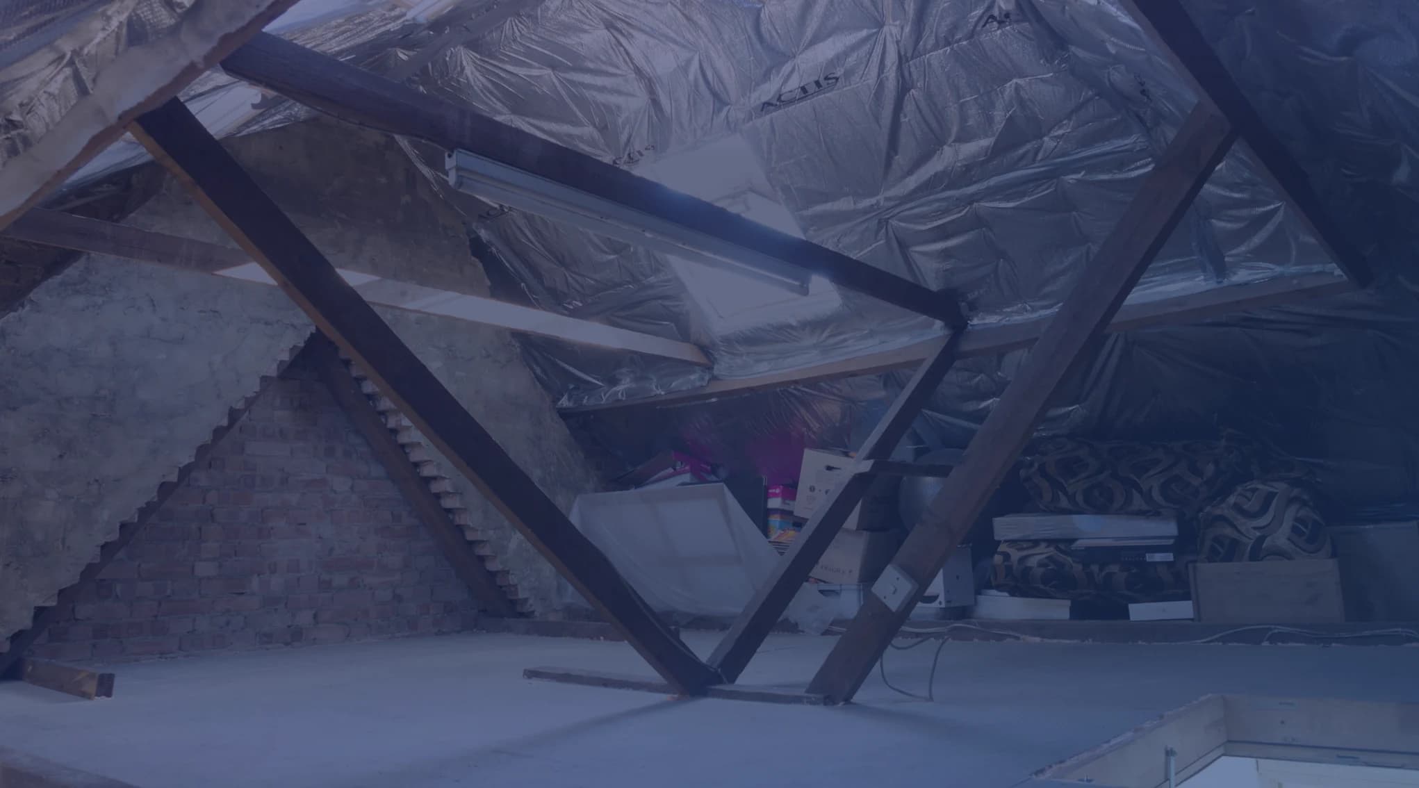 Attic insulation being installed in a home financed with a VA loan