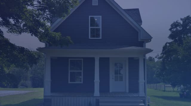 Real estate agent reviewing a home contract with military clients